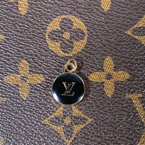 Beautiful black and gold Upcycled Louis Vuitton skittle charm